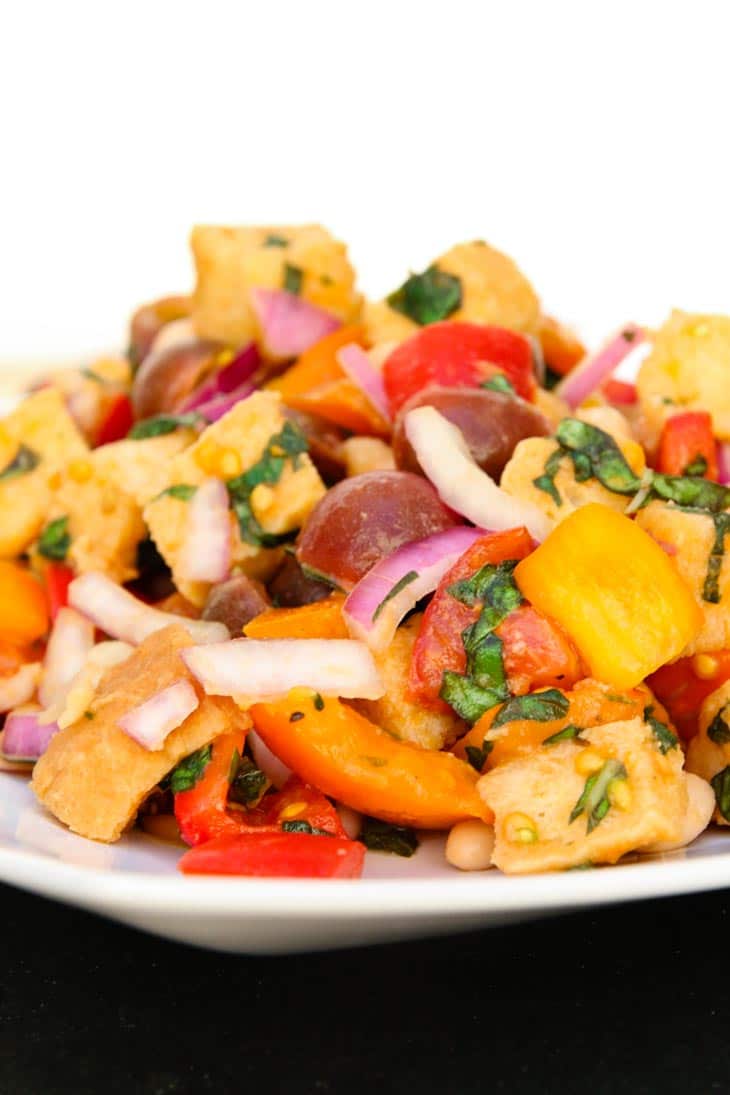 A close up of tuscan panzanella salad on a plate