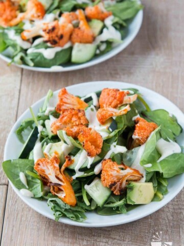 Mixed Green Salad with Buffalo Roasted Cauliflower, Avocado, Vegan Cucumber Ranch #vegan #glutenfree | www.VegetarianGastronomy.com