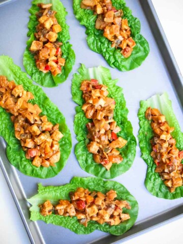 Tofu peanut lettuce wraps on a baking tray