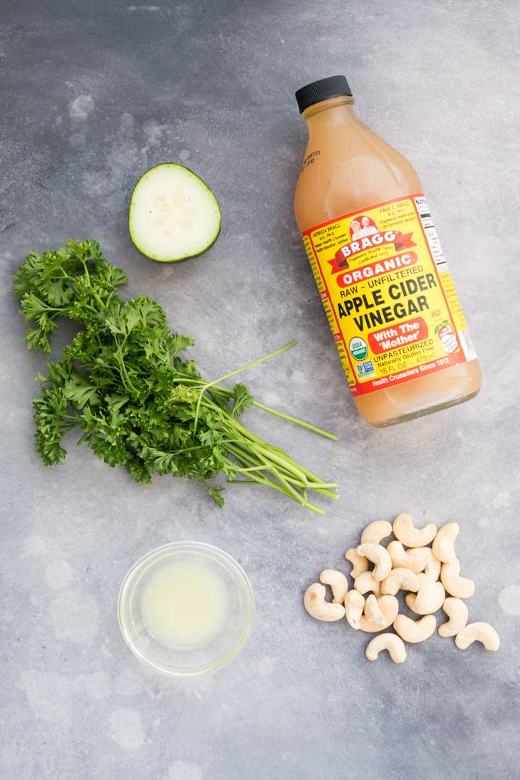 Overhead photograph showing the ingredients needed to make a healthy vegan dairy free ranch dressing.